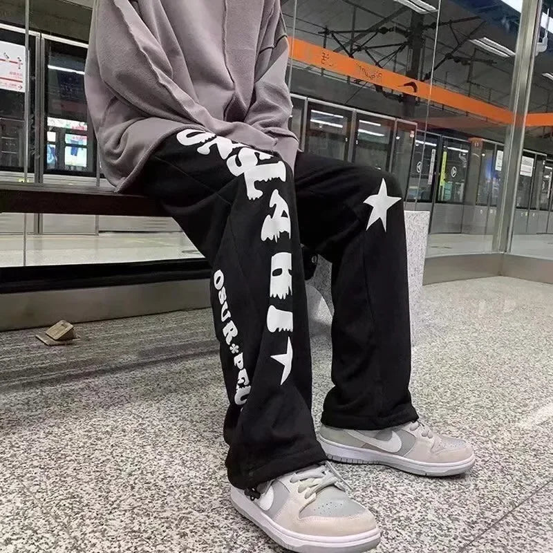 Nouveaux hommes pantalons de survêtement légers couleur unie Joggers impression hommes Baggy pantalon Streetwear pantalons longs hommes tendance polyvalent