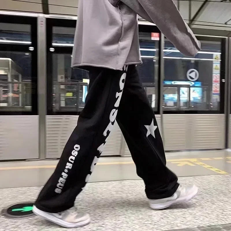 Nouveaux hommes pantalons de survêtement légers couleur unie Joggers impression hommes Baggy pantalon Streetwear pantalons longs hommes tendance polyvalent