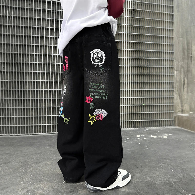 Nouvelle mode enfants jean noir avec dessin pour garçons filles décontracté Streetwear Denim pantalon unisexe enfant coupe droite jean pantalon