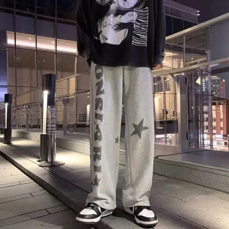 Nouveaux hommes pantalons de survêtement légers couleur unie Joggers impression hommes Baggy pantalon Streetwear pantalons longs hommes tendance polyvalent