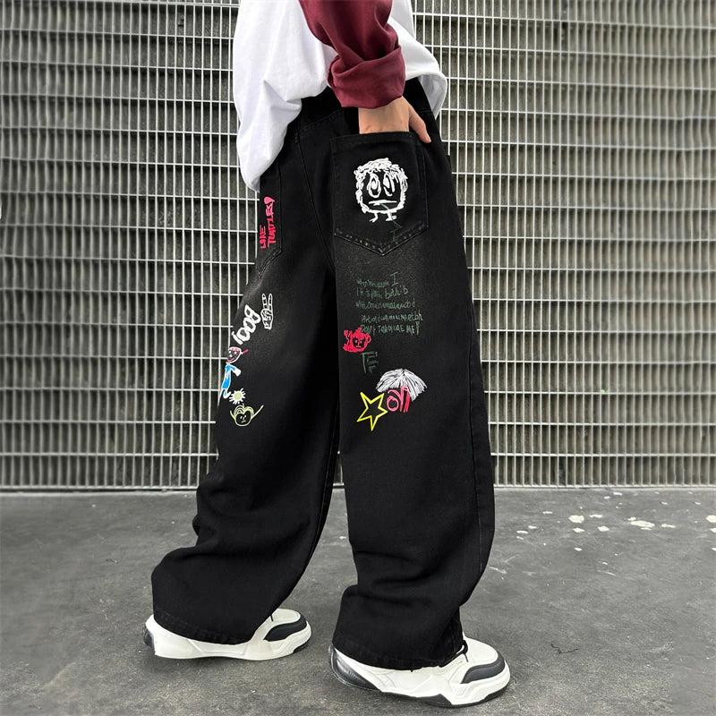 Nouvelle mode enfants jean noir avec dessin pour garçons filles décontracté Streetwear Denim pantalon unisexe enfant coupe droite jean pantalon