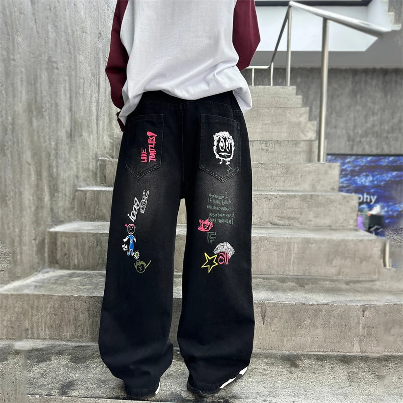 Nouvelle mode enfants jean noir avec dessin pour garçons filles décontracté Streetwear Denim pantalon unisexe enfant coupe droite jean pantalon