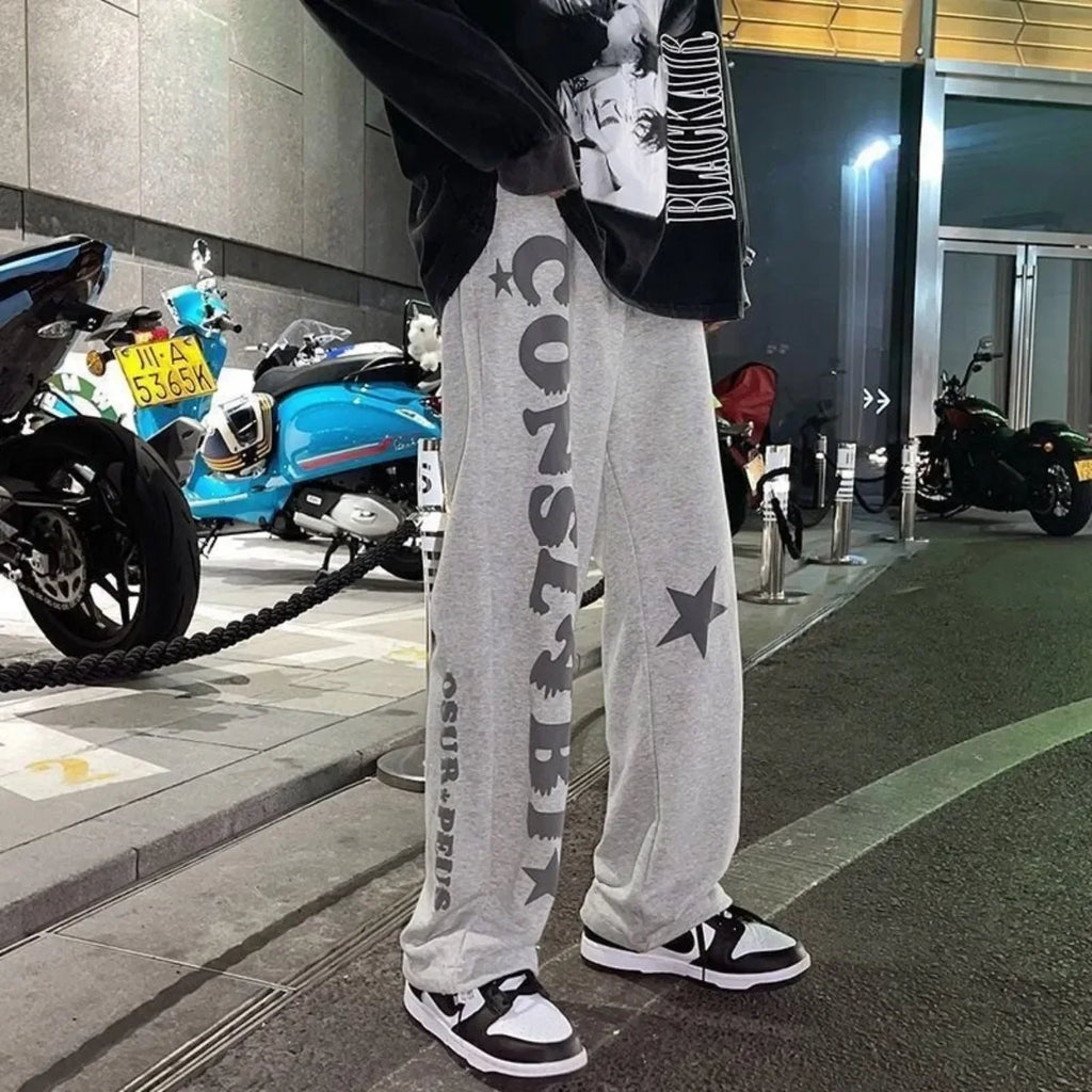 Nouveaux hommes pantalons de survêtement légers couleur unie Joggers impression hommes Baggy pantalon Streetwear pantalons longs hommes tendance polyvalent