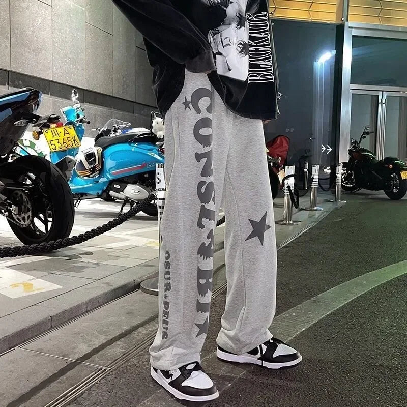 Nouveaux hommes pantalons de survêtement légers couleur unie Joggers impression hommes Baggy pantalon Streetwear pantalons longs hommes tendance polyvalent