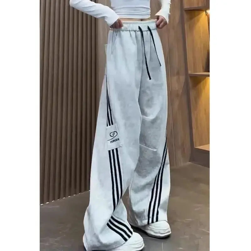 Taille élastique pantalons décontractés femmes automne nouveau trois rayures jambe large pantalons de survêtement polyvalent jambe droite longueur de plancher pantalon