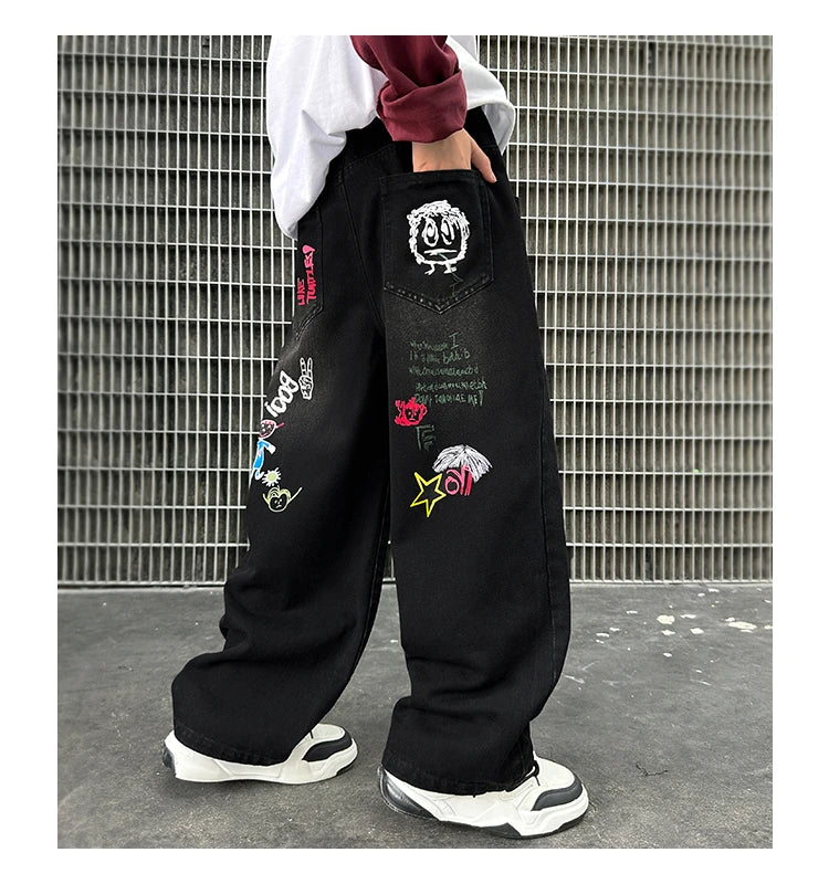 Nouvelle mode enfants jean noir avec dessin pour garçons filles décontracté Streetwear Denim pantalon unisexe enfant coupe droite jean pantalon